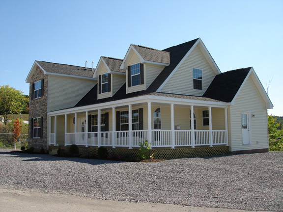 Patriot Home Sales - Model: HK101-A Sample Home Pennwest Ridgefield Cape / Two Story Combination Front and Gable End Exterior Photo