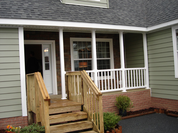 Patriot Home Sales - Model: HF114-A Sample Home Pennwest Davenport II Covered Porch Photo Patriot Home Sales - Model: HF114-A Sample Home Pennwest Davenport II Covered Porch Photo