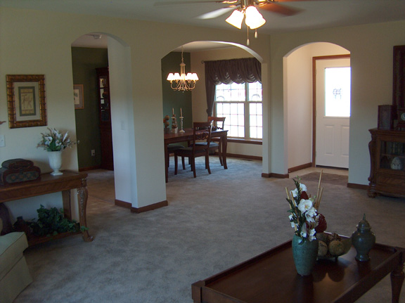 Patriot Home Sales - Model: HF117-A Sample Home Pennwest Quincy II Master Bathroom Patriot Home Sales - Model: HF117-A Sample Home Pennwest Quincy II Great Room Towards Foyer Photo